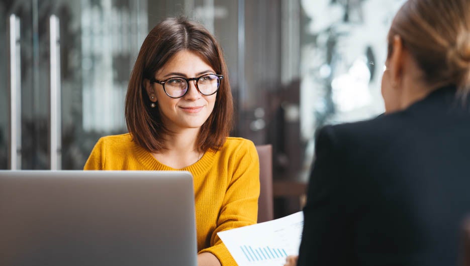 Group of happy business people have meeting at workplace in offi