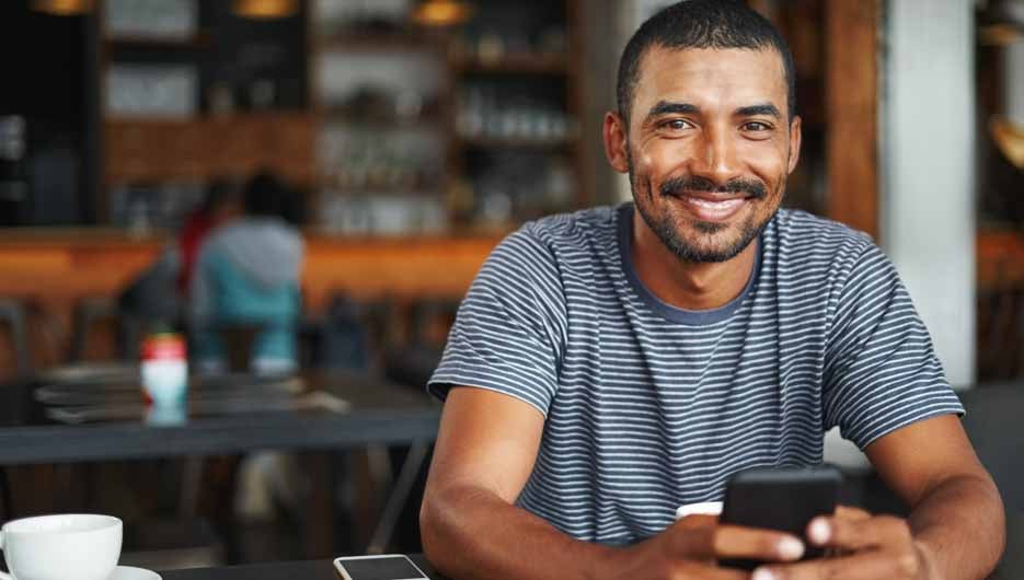 Portrait of a young man in cafe